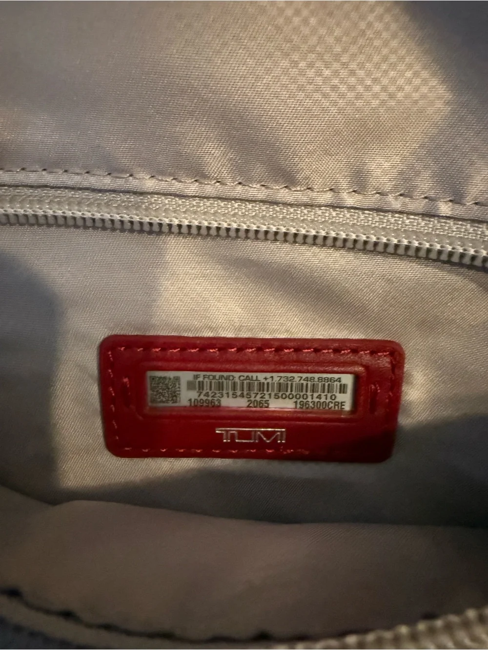 Tumi branded backpack